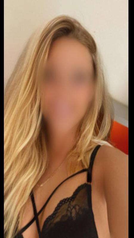 Holly - 34D Busty Blonde English Escort